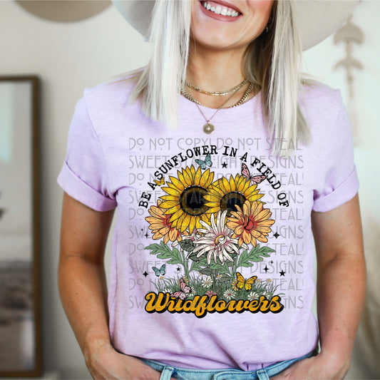 SUNFLOWER IN A FIELD OF WILDFLOWERS